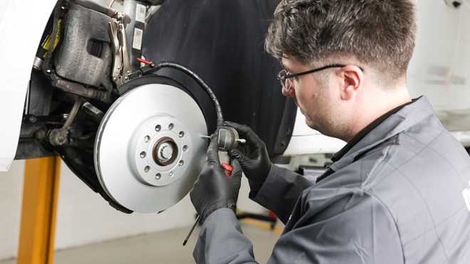 Technician while installing brake disc